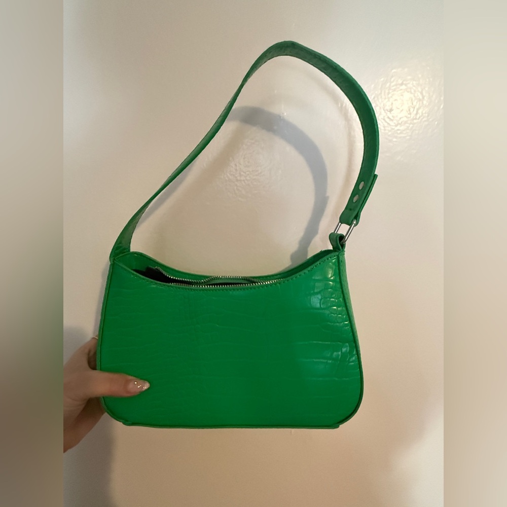 Urban Outfitters Green faux crocodile skin purse.